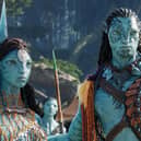Ronal (Kate Winslet), Tonowari (Cliff Curtis), and the Metkayina Clan (Photo: © 2022 20th Century Studios)
