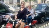 Suzy Eddie Izzard was spotted by a delighted fan careering around London on a Boris bike.
