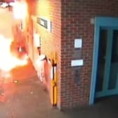 Video grab of the moment an e-bike exploded, causing a "ferocious" fire - as its owner stood waiting for a train. 