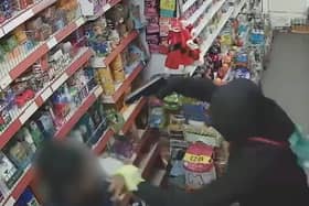 CCTV footage of an armed attack on a shop in Eltham