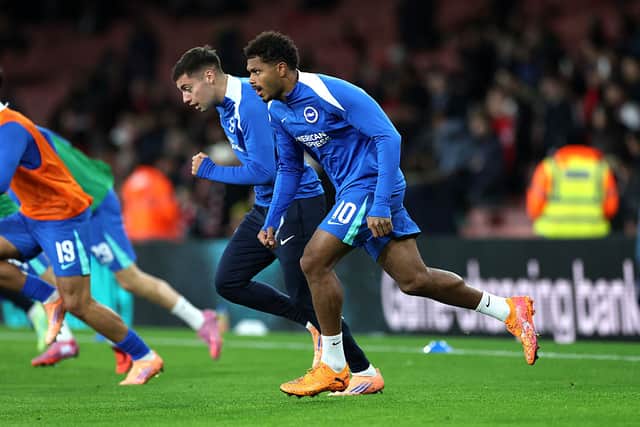 Georginio Rutter and Stefanos Tzimas warm-up against Arsenal