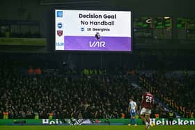 Brighton survived a late VAR check to claim a point against West Ham