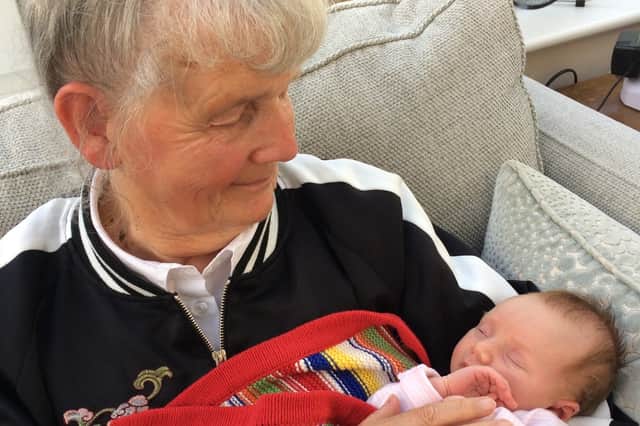 Jane Burrows holding granddaughter Hannah