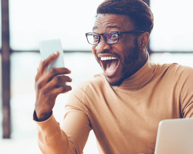 Checking the result – players can now take part in daily £1 lottery draws online