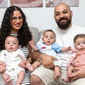 Bishoy with wife Marina and their triplets Miracle, Levi, and Suriel.
