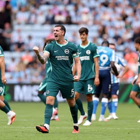 Brighton captain Lewis Dunk celebrates victory at Coventry