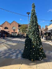 Halloween is still ahead of us, but a Christmas tree complete with lights and baubles has already brought a festive feel to Piries Place in Horsham.