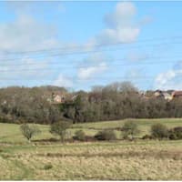 250 homes near Eastbourne approved on appeal  - council criticised for 'unreasonable behaviour'