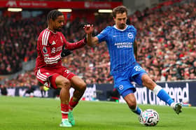 Brighton's French defender Olivier Boscagli in action against Liverpool at Anfield