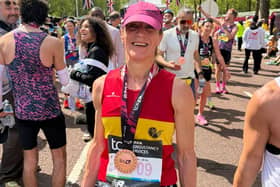 Lewes AC runner Heidi Hodgson celebrates at the finish of the London Marathon.