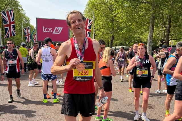 2015 Bake Off finalist and Lewes AC Member Ian Cumming, with his medal after finishing Sunday’s race.