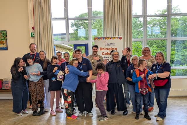 Cllr Duncan Pascoe, Town Mayor of Haywards Heath, with members, parents and staff of Kangaroos Mid Sussex