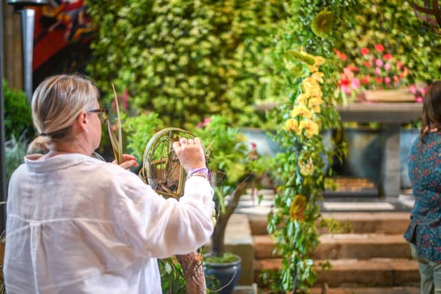 Floral designer at the Festival of Flowers