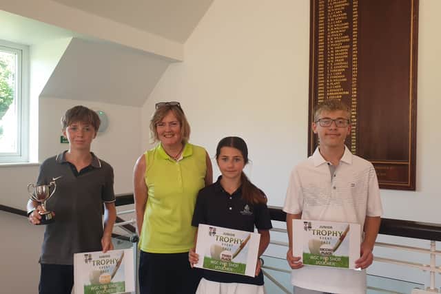 Lady Captain Rachelle Black with the prize winners