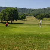 Competitors putting for points.
