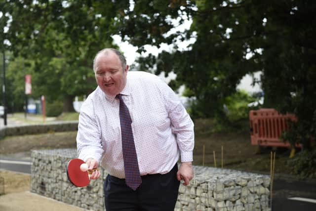 Seating and recreational features such as outdoor table tennis facilities at Woolborough Lane