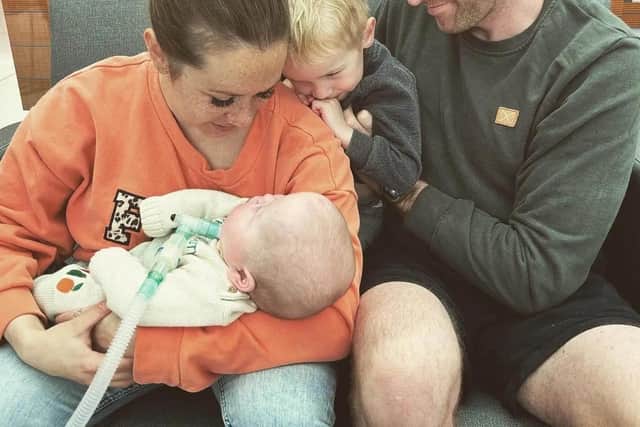 Eloise and Ash Kent with their son Harrison and baby Beau