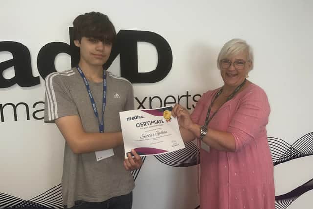 Student Settar Gokham with Medica's Group Head of People and Culture, Fiona Carr