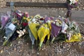 Flowers in Shoreham to commemorate the El-Khawas family