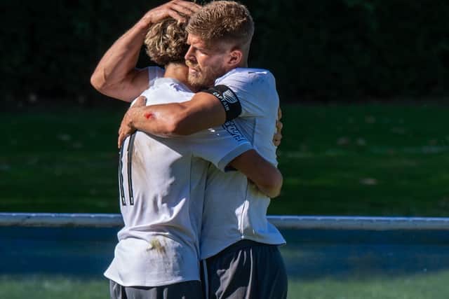 Mison celebrates with skipper Jack Shonk