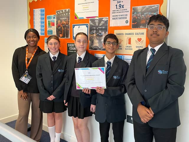 Students celebrating the award at The Gatwick School.