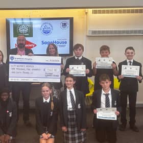 FCC give cheque to St Wilfirnds Hospice