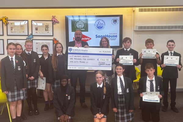 FCC give cheque to St Wilfirnds Hospice