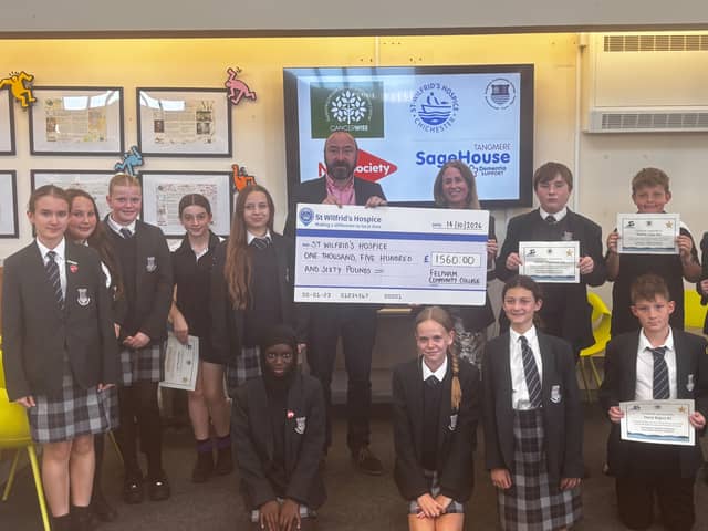 FCC give cheque to St Wilfirnds Hospice