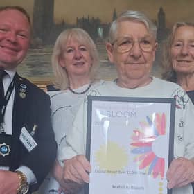 Bexhill In Bloom President,  Chair,  Secretary and Committee Member displaying their Gold Award 