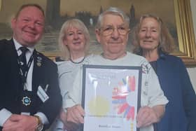 Bexhill In Bloom President,  Chair,  Secretary and Committee Member displaying their Gold Award 