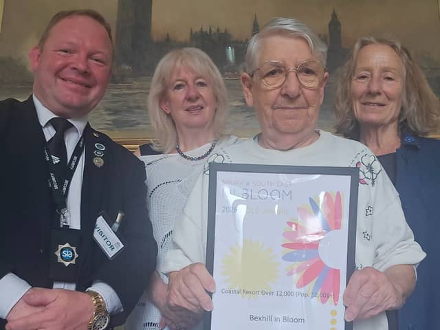Bexhill In Bloom President,  Chair,  Secretary and Committee Member displaying their Gold Award 