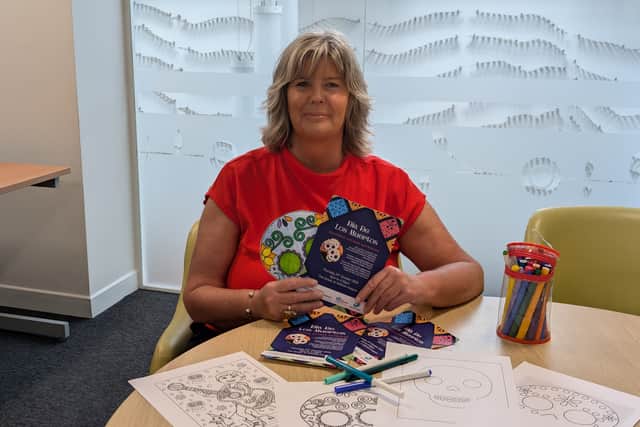 Head of Patient and Family Support, Ella Williams, getting ready for Dia de los Muertos.