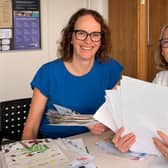 Alison Bennett MP with local artist Kate Harries, judging the entries for the competition.