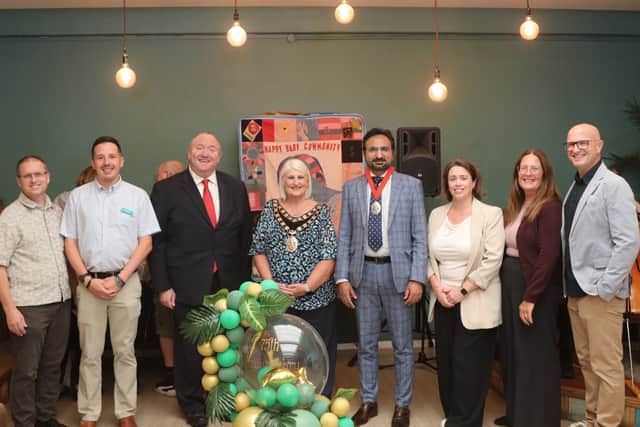 The Mayor, Deputy Mayor and Leader of the Council join centre users and trustees to celebrate 75 years of the Charis Centre