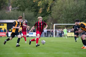 Goalscorer Morgan Prill runs at the East Grinstead defence