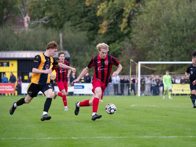 Goalscorer Morgan Prill runs at the East Grinstead defence
