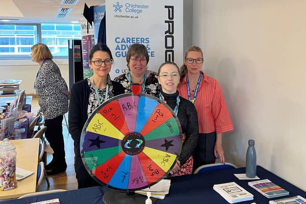 Four members of the college group's career's advice and guidance team at a careers fair.
