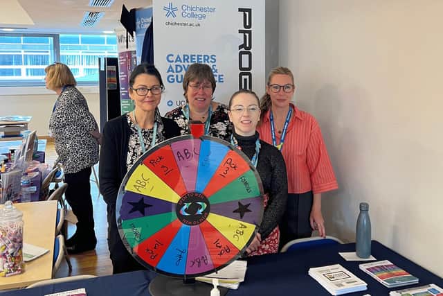 Four members of the college group's career's advice and guidance team at a careers fair.