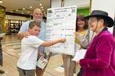 Wendy Taylor and Jo Smith talking with shoppers at Quentin’s with Climate and Nature Meter