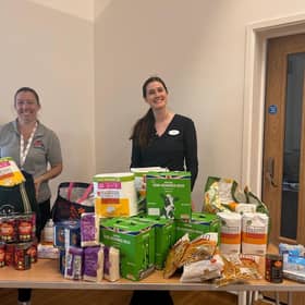 Anna Sharkey 
Bentswood Hub C.I.C. Director  , alongside Specsavers store manager Millie Denyer 
