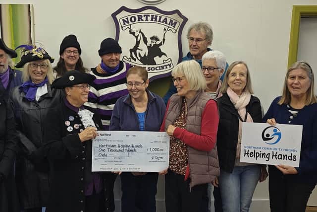 NBS hands cheque to Helpoing Hands