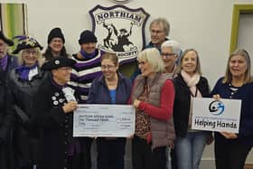 NBS hands cheque to Helpoing Hands