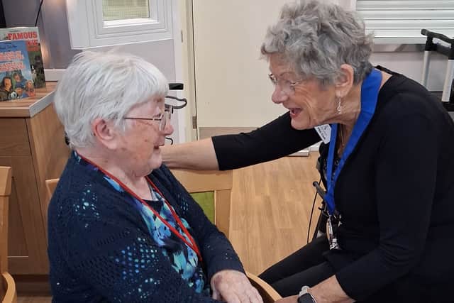 Deputy Mayor Vikki Cook chatting with a resident at Saxonwood