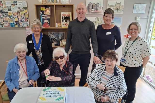 Residents (front row) joined by (back row left to right) Deputy Mayor Vikki Cook, Kieran Mullan MP, Tracy Evans Chief Executive of Sussex Housing & Care and Sandra Everley Deputy Manager at Saxonwood