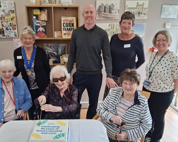 Residents (front row) joined by (back row left to right) Deputy Mayor Vikki Cook, Kieran Mullan MP, Tracy Evans Chief Executive of Sussex Housing & Care and Sandra Everley Deputy Manager at Saxonwood