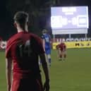 Lewis Croal adds the ninth Hassocks goal whilst the Beacon scoreboard struggles to keep up