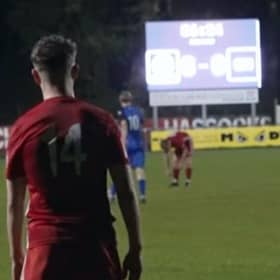 Lewis Croal adds the ninth Hassocks goal whilst the Beacon scoreboard struggles to keep up