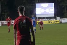 Lewis Croal adds the ninth Hassocks goal whilst the Beacon scoreboard struggles to keep up