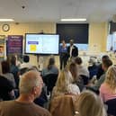 Catriona Neville and Charles Nduka, Consultant Plastic Surgeon at Queen Victoria Hospital and Founder of Facial Palsy UK, speaking at the Living with Facial Palsy event.