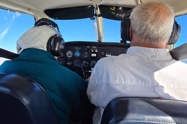 Elisabeth flying the plane
